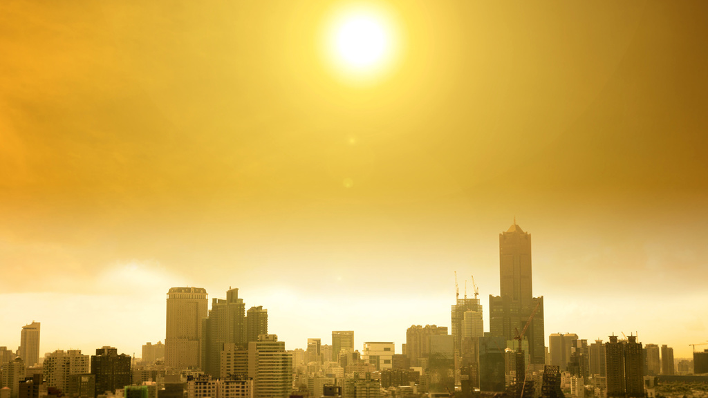 Hot sun glowing over a city